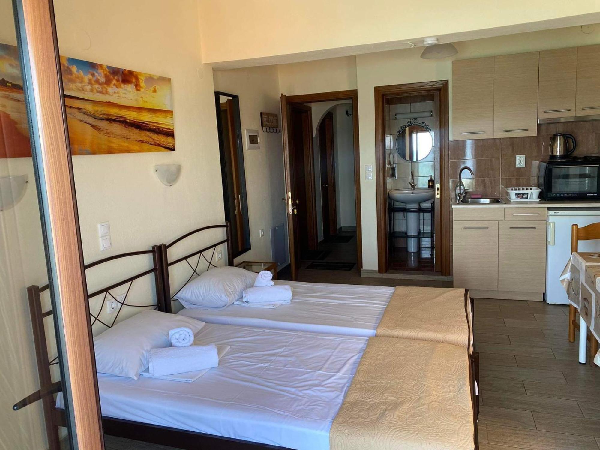 Diolkos Apartement Nea Roda Quarto foto