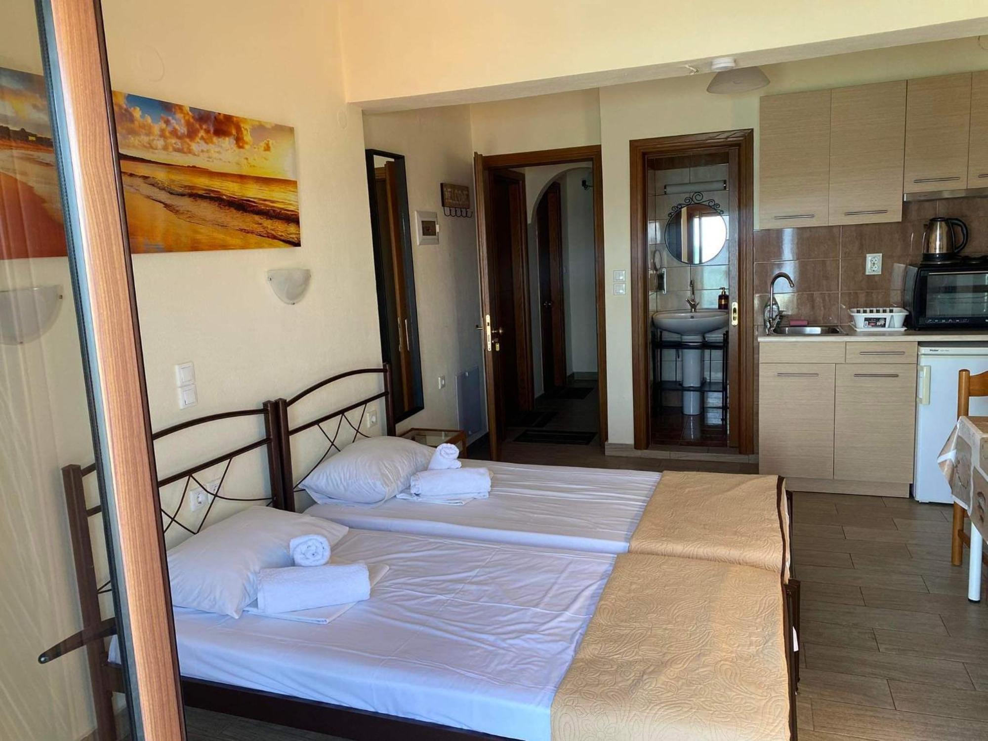 Diolkos Apartement Nea Roda Quarto foto